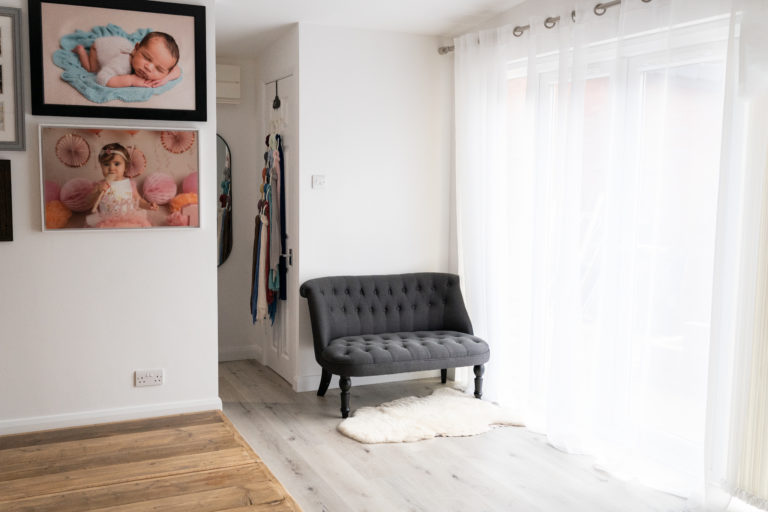 comfy sofa in a photography studio with white walls by Newborn Photographer in Lichfield staffordshire